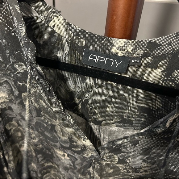 X small flowy cropped bell sleeved blouse w/ ties containing gold metal balls. - Picture 3 of 5